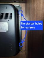 Nice but no starter holes in the cabinet for the fire/heating piece. 5